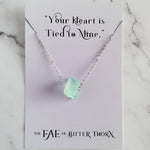 Load image into Gallery viewer, Silver Necklace with Green Crystal from The Fae of Bitter Thorn series

